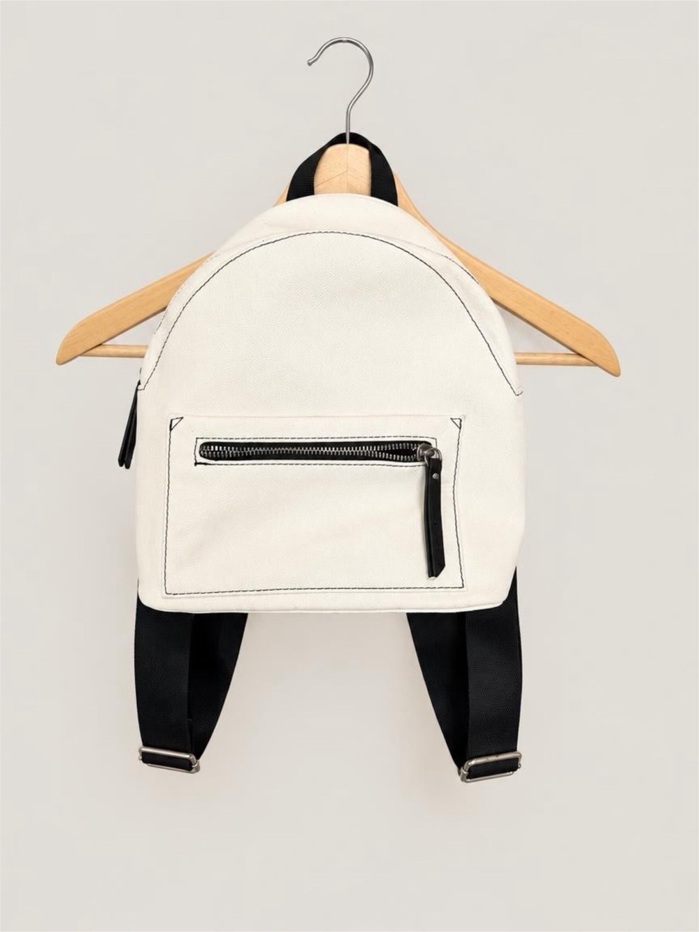 Gently Used Minimal White Faux Leather Mini Backpack with Black Straps